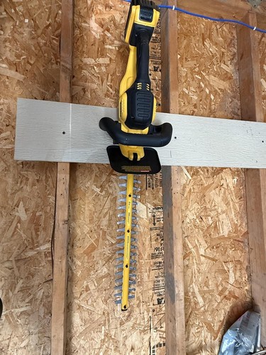 Black hedge trimmer - hedge, wall